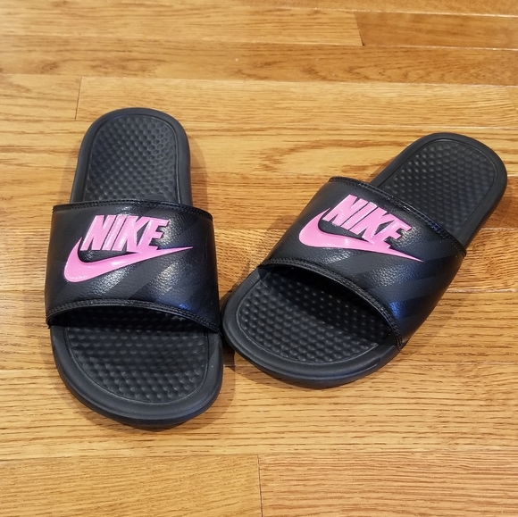 pink and purple nike slides